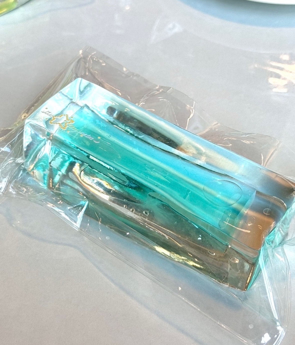 Long Cubed Aqua Filled Squishy.