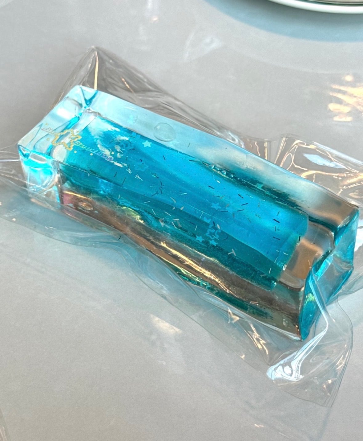 Long Cubed Aqua Filled Squishy.